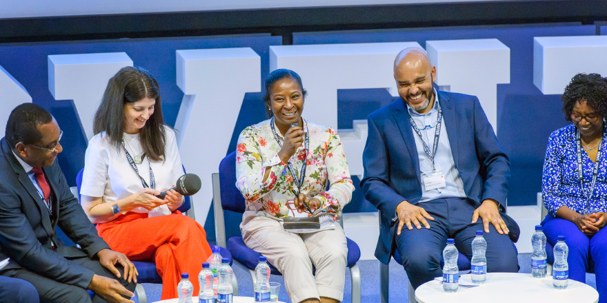 4 panel guests laughing