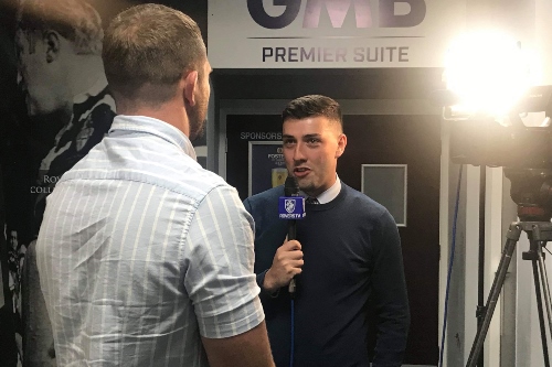 Harry McMullen interviewing someone