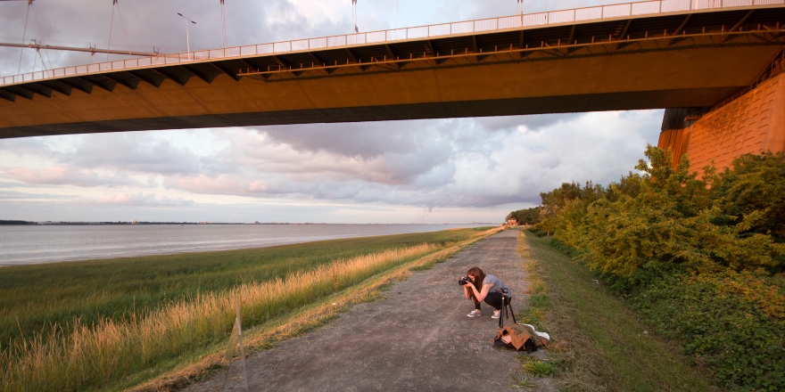 Photographer shooting from the banks of the river 